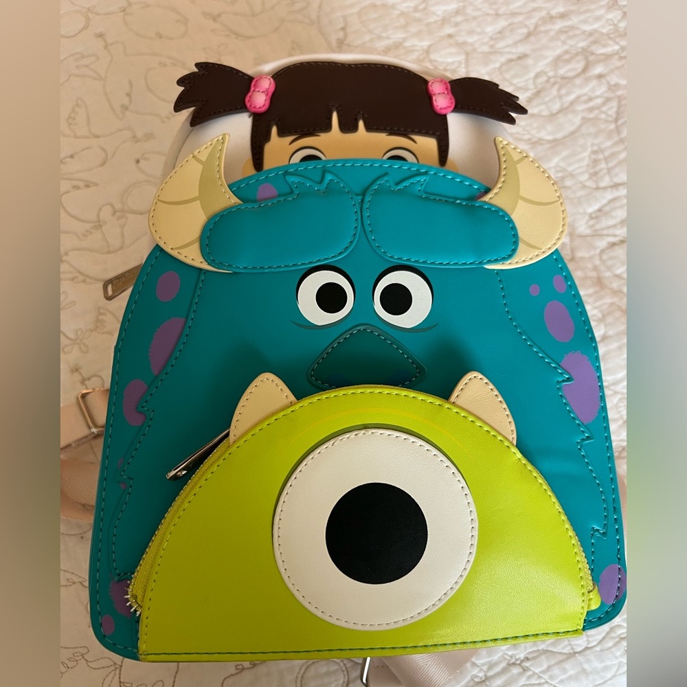 Loungefly Blue and Green Monster Backpack